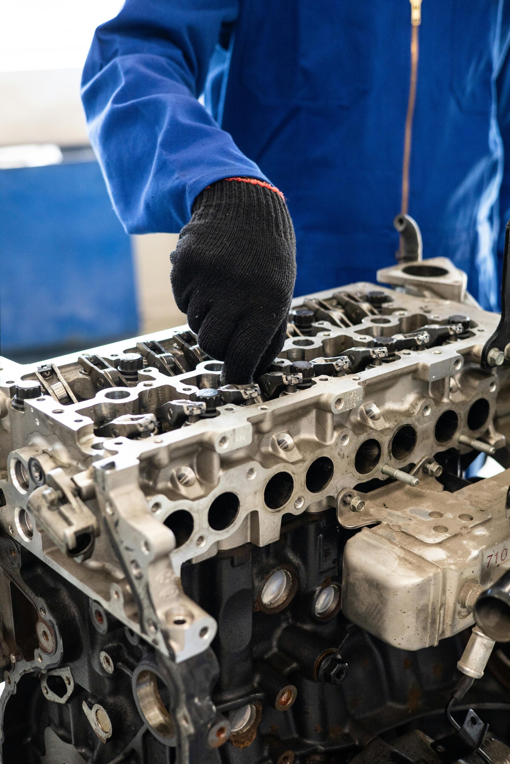 Mechanic working on a truck engine parts